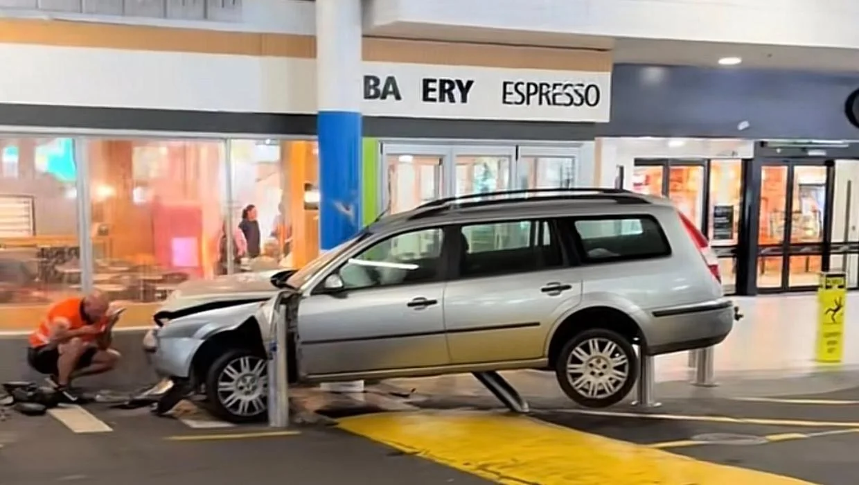Mall vehicle crash prevented by crash-rated bollards